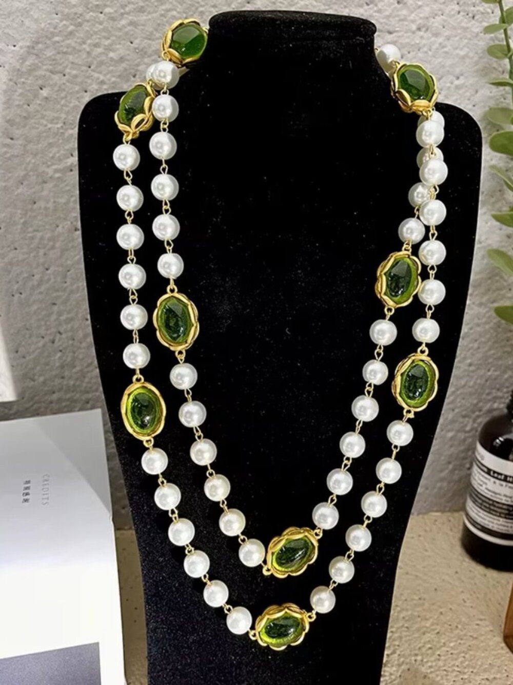 Peridot elegance meets timeless pearls. Ditch the ordinary and embrace this stat